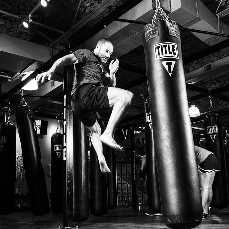 Mixed Martial Arts Lessons for Adults in Carrollton TX - Flying Knee Black and White MMA
